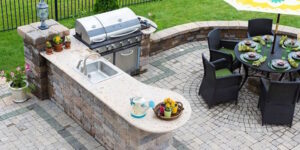 Outdoor Kitchen adorned in Hardscapes by Outdoor Kreations Hardscapes of the Grand Strand